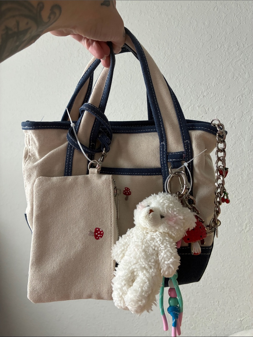 Madden Girl Mushroom Cream Canvas Mini Tote with Navy Trim and Charm